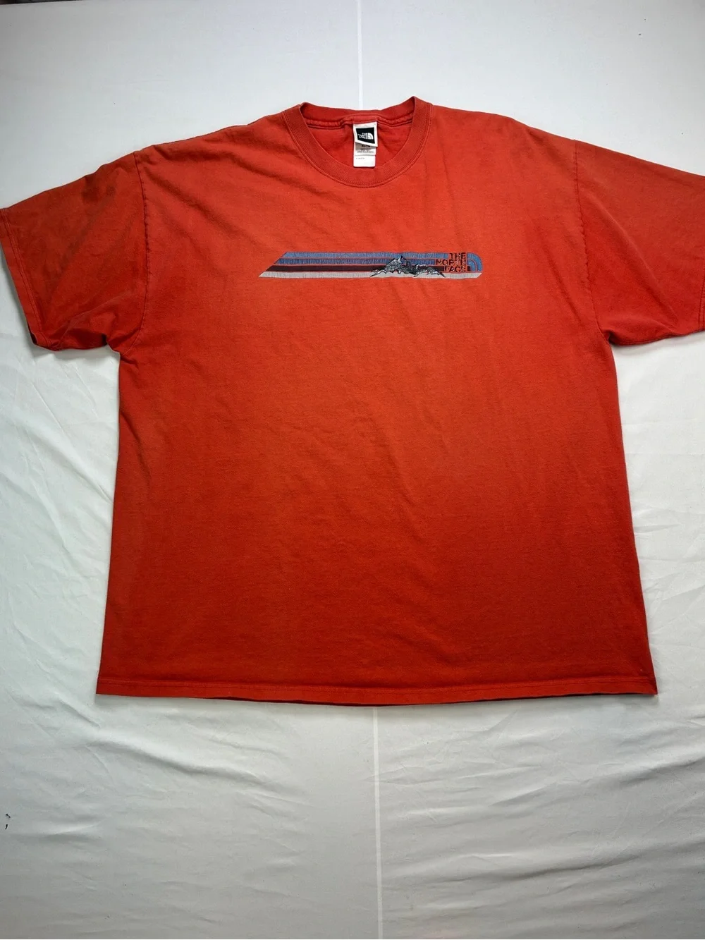 The North Face Red/Orange Short Sleeve Tee with Chest Stripe Graphic